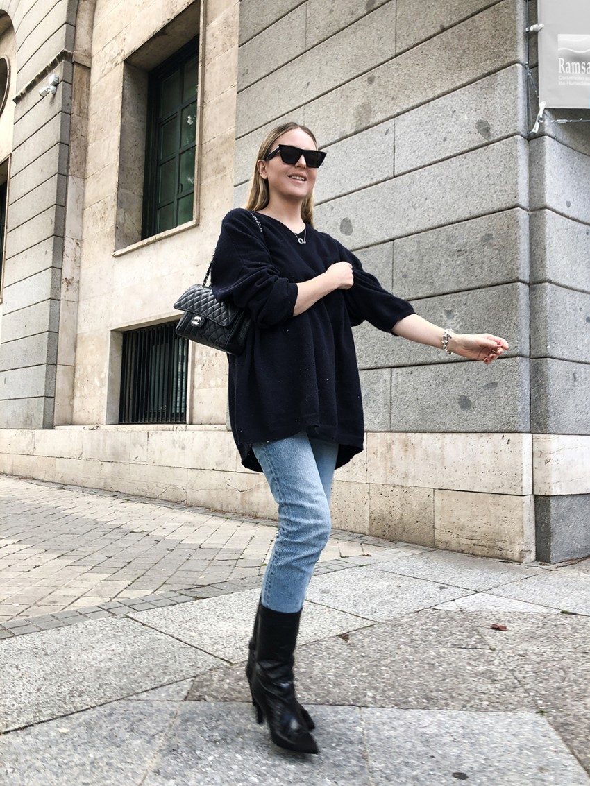 Trini | Loewe sweater Chanel boots