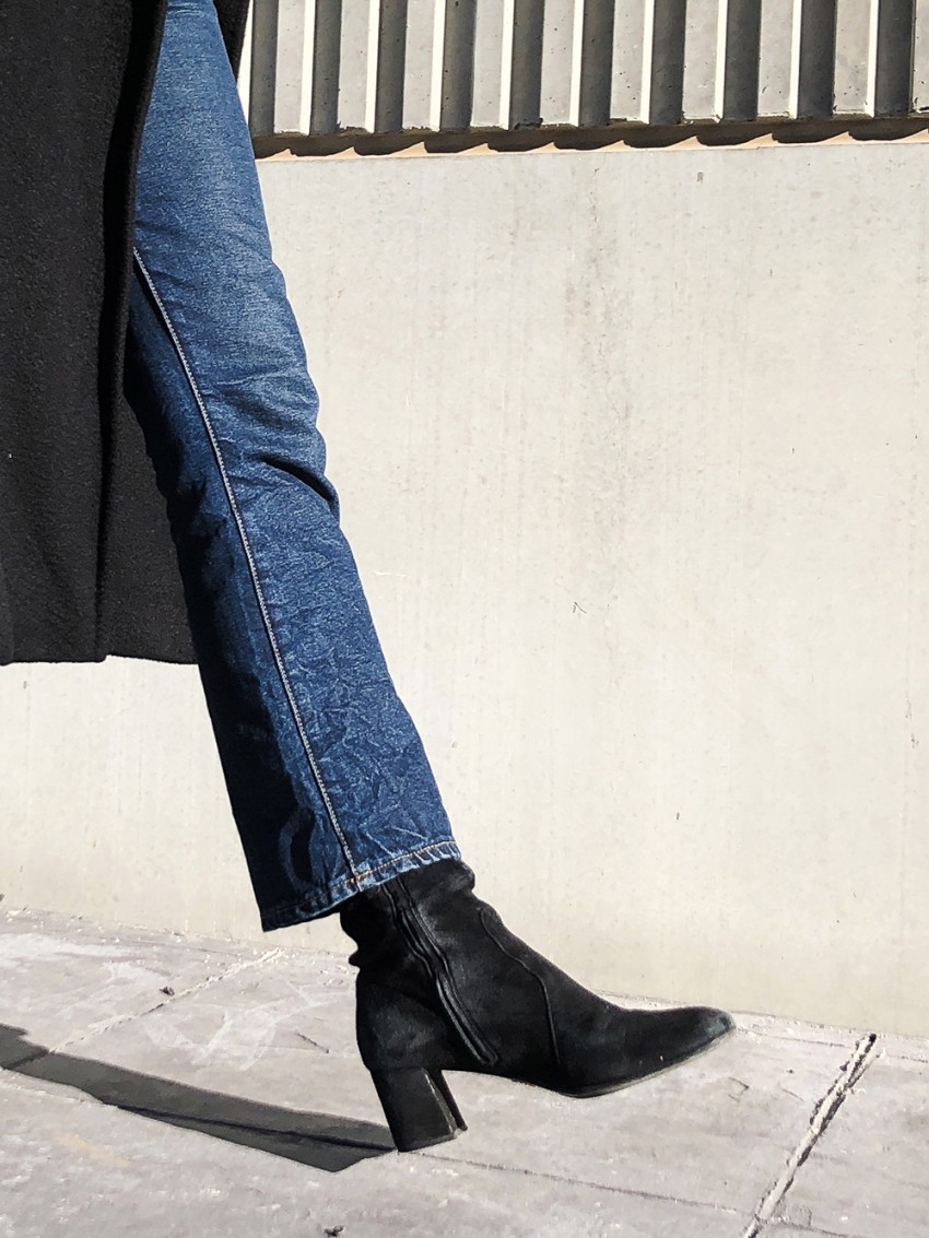 Trini | Max Mara black coat Khaite jeans