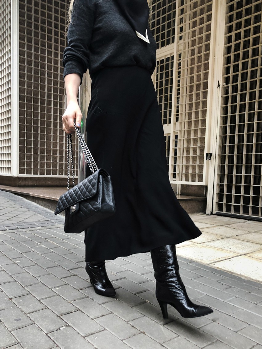 Trini | The Row skirt Chanel boots